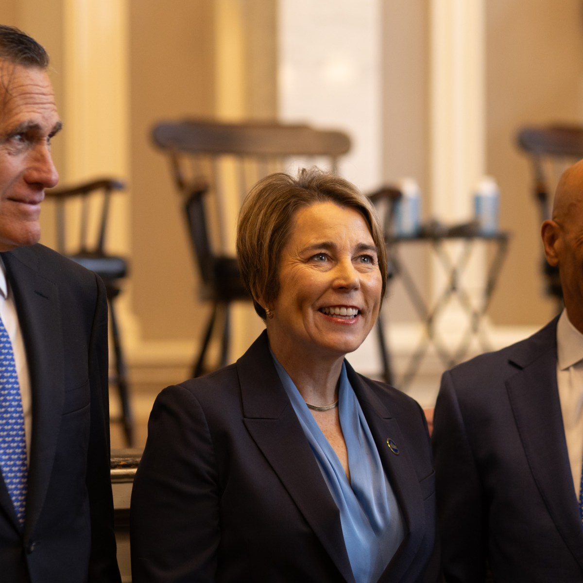 Cheers drown out Healey as she signs immigrant protection bill