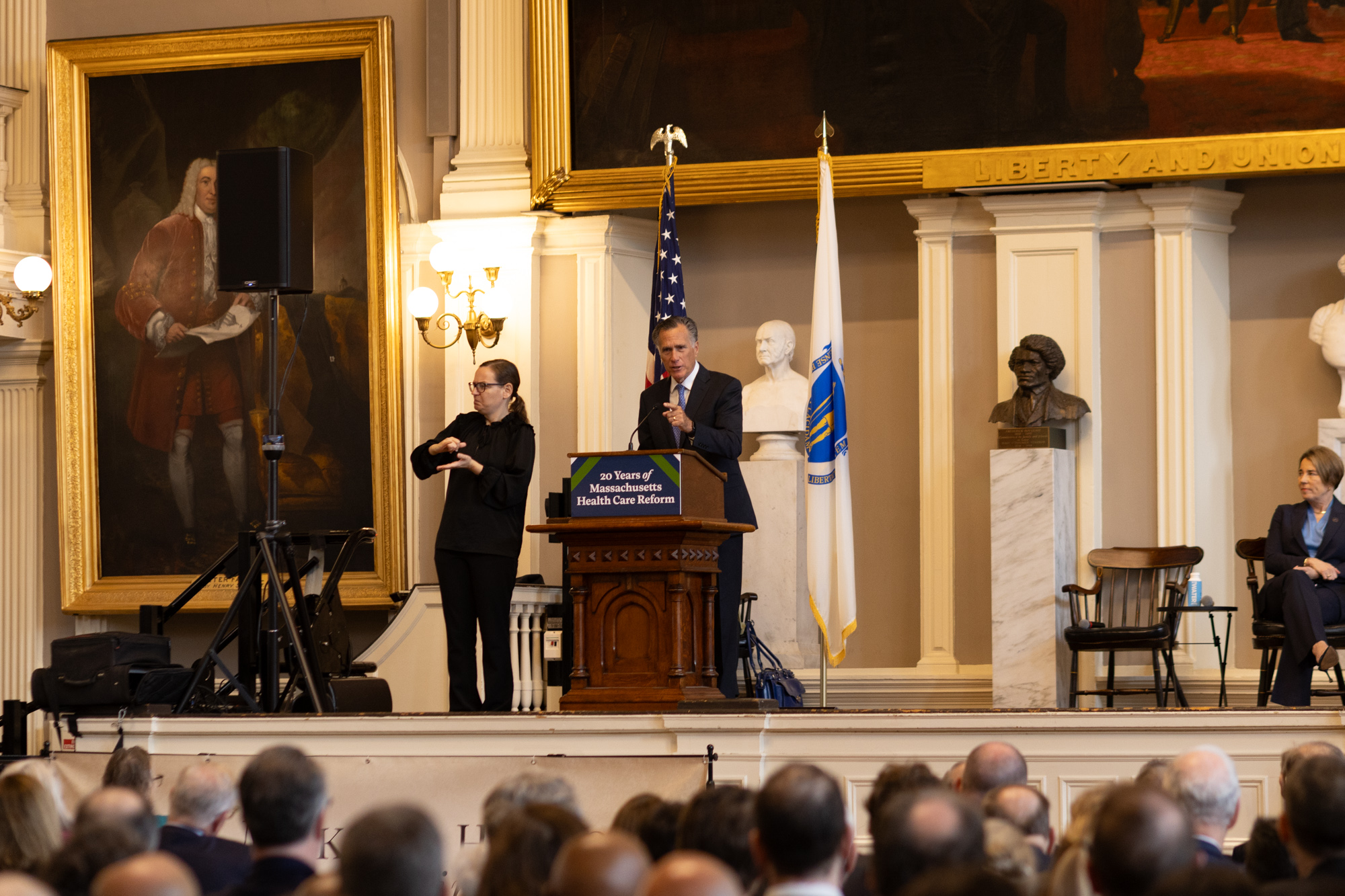 Massachusetts celebrates health care milestone amid gathering storm clouds